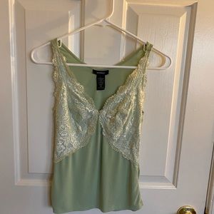 Women’s casual to dressy top. Soft lime color and material.